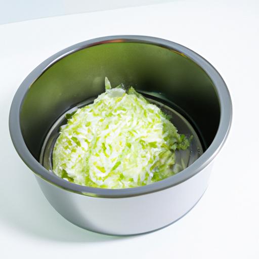 Shredding the cabbage allows for even cooking in the microwave.