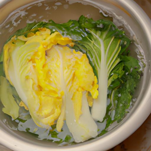 Soaking napa cabbage in water to loosen dirt and disinfect.